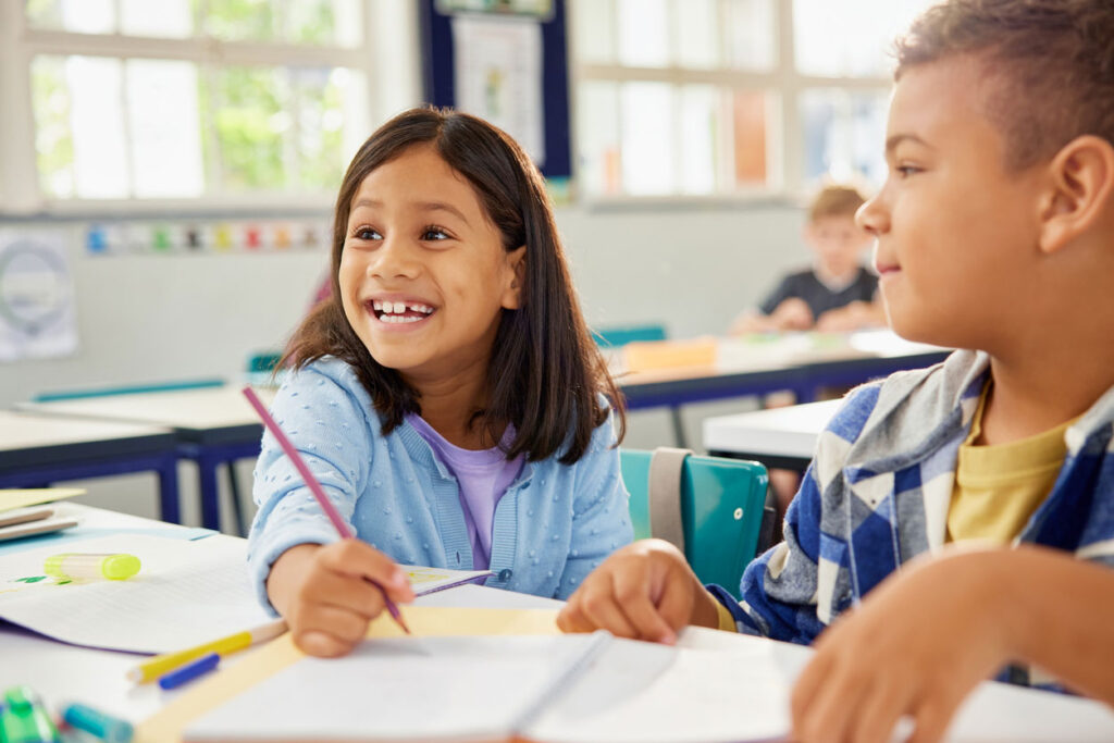 Children working together on a classroom activity