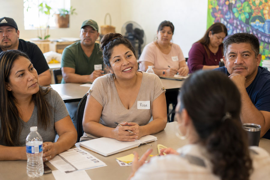 Adults participating in a group discussion